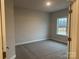 Bright bedroom with carpet and large window at 104 Kerr Walk Dr # 14, Statesville, NC 28677