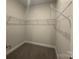 Spacious walk-in closet with wire shelving at 104 Kerr Walk Dr # 14, Statesville, NC 28677