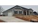 Gray siding house with stone accents and a two-car garage at 104 Kerr Walk Dr # 14, Statesville, NC 28677