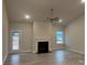 Spacious living room with fireplace and hardwood floors at 104 Kerr Walk Dr # 14, Statesville, NC 28677