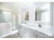 Double vanity bathroom with a large walk in shower at 114 River Ridge Ln, Hickory, NC 28601