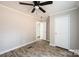 Bright bedroom with wood-look flooring and ceiling fan at 114 River Ridge Ln, Hickory, NC 28601