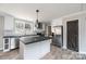 Modern kitchen with island and stainless steel appliances at 114 River Ridge Ln, Hickory, NC 28601