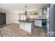 Modern kitchen with island and stainless steel appliances at 114 River Ridge Ln, Hickory, NC 28601