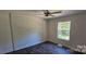 Bedroom with a shiplap accent wall and dark flooring at 116 River Ridge Ln, Hickory, NC 28601