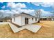 Spacious backyard featuring a newly installed concrete patio and well kept home exterior at 1200-1 Stanton Dr, Shelby, NC