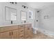 Modern bathroom features double sinks, wood cabinets, and a marble tile shower at 1200-1 Stanton Dr, Shelby, NC