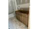 Simple bathroom vanity with a tub in the background at 1200-1 Stanton Dr, Shelby, NC