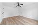 Bright bedroom features wood floors, white walls and doors, and a ceiling fan at 1200-1 Stanton Dr, Shelby, NC