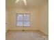 Simple bedroom with carpet and two windows at 121 Sierra Woods Dr, Troutman, NC 28166