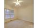 Bright bedroom with carpet flooring and window blinds at 121 Sierra Woods Dr, Troutman, NC 28166