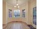 Bright dining area with hardwood floors and bay window at 121 Sierra Woods Dr, Troutman, NC 28166