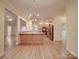 Kitchen boasts stainless steel appliances, hardwood floors and an island at 121 Sierra Woods Dr, Troutman, NC 28166