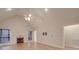 Spacious living room with hardwood floors, fireplace, and vaulted ceiling at 121 Sierra Woods Dr, Troutman, NC 28166