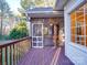 Side view of screened porch and deck at 121 Sierra Woods Dr, Troutman, NC 28166