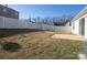 Backyard view showcasing patio and fence at 13502 Tartarian Ct, Charlotte, NC 28215