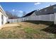 Private backyard with patio and fenced area at 13502 Tartarian Ct, Charlotte, NC 28215