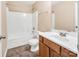 Clean bathroom with tub, toilet, and vanity at 13502 Tartarian Ct, Charlotte, NC 28215