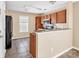 Kitchen features granite countertops and stainless steel appliances at 13502 Tartarian Ct, Charlotte, NC 28215