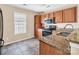 Kitchen features granite countertops and stainless steel appliances at 13502 Tartarian Ct, Charlotte, NC 28215