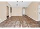 Living room features tile floors and neutral walls at 13502 Tartarian Ct, Charlotte, NC 28215