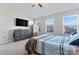 Bright bedroom with large windows and dresser at 13883 Clayborn St, Midland, NC 28107