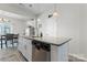 Modern kitchen island with granite countertops and stainless steel appliances at 13883 Clayborn St, Midland, NC 28107