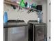 Laundry room with washer, dryer, and shelving at 13883 Clayborn St, Midland, NC 28107