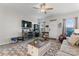 Living room features fireplace, TV, and access to kitchen at 13883 Clayborn St, Midland, NC 28107