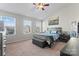 Spacious main bedroom with large bed, city view, and ample natural light at 13883 Clayborn St, Midland, NC 28107