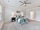 Bright bedroom with ceiling fan and access to bathroom at 1410 Tranquility Blvd, Lancaster, SC 29720