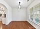 Charming dining area with hardwood floors and large windows at 1410 Tranquility Blvd, Lancaster, SC 29720