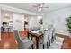 Formal dining room with hardwood floors and seating for six at 1410 Tranquility Blvd, Lancaster, SC 29720