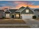 Stunning two-story home with stone accents and a 2-car garage at 1410 Tranquility Blvd, Lancaster, SC 29720