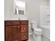 Simple bathroom with toilet, vanity, and tub at 153 Crownpiece St, Troutman, NC 28166