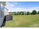 Large grassy backyard with privacy fence at 17527 Austins Creek Dr, Charlotte, NC 28278