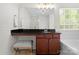 Bathroom vanity with granite countertop and a large mirror at 17527 Austins Creek Dr, Charlotte, NC 28278