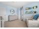 Neutral-toned Bedroom with dresser and glider at 17527 Austins Creek Dr, Charlotte, NC 28278