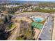 Aerial view of community pool, basketball court, and tennis courts at 17527 Austins Creek Dr, Charlotte, NC 28278