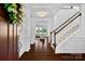 Bright entryway with hardwood floors and staircase at 17527 Austins Creek Dr, Charlotte, NC 28278