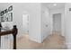 Upstairs hallway with access to bedrooms and closets at 17527 Austins Creek Dr, Charlotte, NC 28278