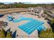 Community pool with lap lanes, a water slide, and a clubhouse at 17527 Austins Creek Dr, Charlotte, NC 28278