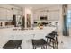 Spacious kitchen with island, stainless steel appliances, and white quartz countertops at 1804 Otter Perch Ln, Fort Mill, SC 29715