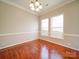 Formal dining room with hardwood floors and crown molding at 18618 The Commons Blvd, Cornelius, NC 28031