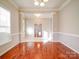 Spacious dining room with hardwood floors and crown molding at 18618 The Commons Blvd, Cornelius, NC 28031