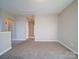 Spacious hallway with neutral walls and carpet at 18618 The Commons Blvd, Cornelius, NC 28031