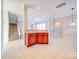 Kitchen island with granite countertops and wood cabinets at 18618 The Commons Blvd, Cornelius, NC 28031