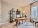 Functional home office featuring built-in shelving, a spacious desk, and large windows at 1980 Copper Path Dr, Fort Mill, SC 29715