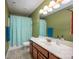 Full bathroom with shower/tub combo and updated vanity at 19914 Wooden Tee Dr, Davidson, NC 28036