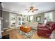 Bright living room with hardwood floors and access to backyard at 19914 Wooden Tee Dr, Davidson, NC 28036